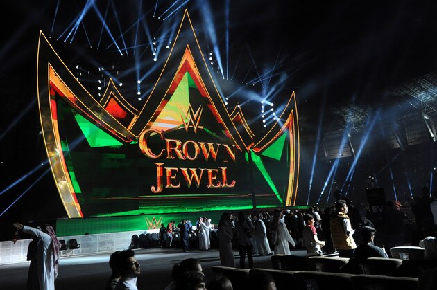 Fans cheer during the World Wrestling Entertainment (WWE) Crown Jewel pay-per-view at the King Saud University Stadium in Riyadh on November 2, 2018. (Photo by Fayez Nureldine / AFP)        (Photo credit should read FAYEZ NURELDINE/AFP/Getty Images)