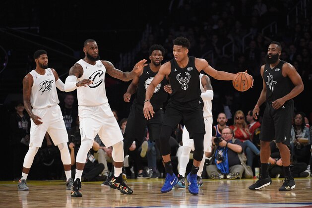 LOS ANGELES, CA - FEBRUARY 18: Giannis Antetokounmpo #34 of Team Stephen dribbles the ball against LeBron James #23 of Team LeBron during the NBA All-Star Game 2018 at Staples Center on February 18, 2018 in Los Angeles, California.  (Photo by Kevork Djansezian/Getty Images)