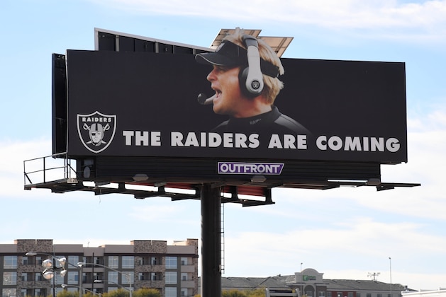 LAS VEGAS, NEVADA - DECEMBER 20:  A billboard featuring the words 'THE RAIDERS ARE COMING' and an image of Oakland Raiders head coach Jon Gruden is seen on the construction site of the Raiders USD 1.8 billion, glass-domed stadium on December 20, 2018 in Las Vegas, Nevada. The stadium is scheduled to be open for the Raiders and the UNLV Rebels football teams in 2020.  (Photo by Ethan Miller/Getty Images)