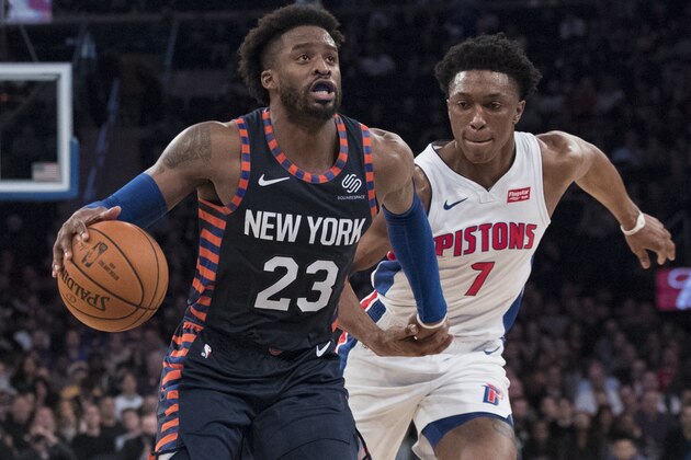 New York Knicks guard Wesley Matthews (23) drives to the basket against Detroit Pistons forward Stanley Johnson (7) during the second half of an NBA basketball game, Tuesday, Feb. 5, 2019, at Madison Square Garden in New York. The Pistons won 105-92. (AP Photo/Mary Altaffer)