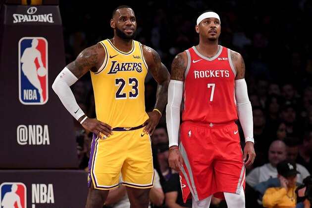 LOS ANGELES, CA - OCTOBER 20:  LeBron James #23 of the Los Angeles Lakers and Carmelo Anthony #7 of the Houston Rockets wait for and inbound at Staples Center on October 20, 2018 in Los Angeles, California.  (Photo by Harry How/Getty Images)