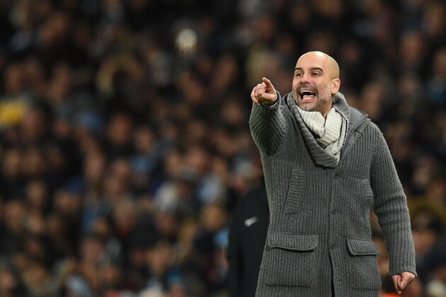 Manchester City's Spanish manager Pep Guardiola gestures from the touchline during the English Premier League football match between Manchester City and Arsenal at the Etihad Stadium in Manchester, north west England, on February 3, 2019. (Photo by Oli SCARFF / AFP) / RESTRICTED TO EDITORIAL USE. No use with unauthorized audio, video, data, fixture lists, club/league logos or 'live' services. Online in-match use limited to 120 images. An additional 40 images may be used in extra time. No video emulation. Social media in-match use limited to 120 images. An additional 40 images may be used in extra time. No use in betting publications, games or single club/league/player publications. /         (Photo credit should read OLI SCARFF/AFP/Getty Images)