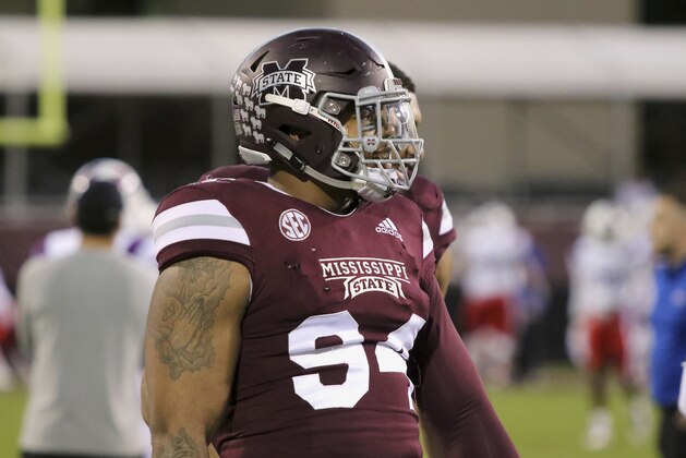 Mississippi State defensive tackle Jeffery Simmons (94) rests during warm-up drills before their NCAA college football game against Louisiana Tech on Saturday, Nov. 3, 2018, in Starkville, Miss. (AP Photo/Jim Lytle)