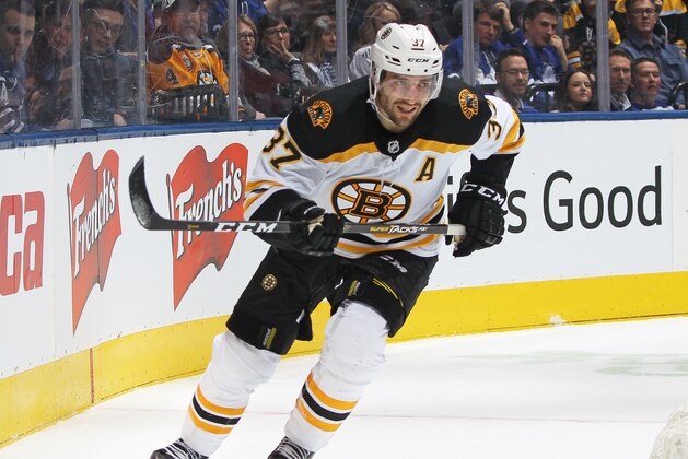 TORONTO, ON - JANUARY 12:  Patrice Bergeron #37 of the Boston Bruins skates against the Toronto Maple Leafs during an NHL game at Scotiabank Arena on January 12, 2019 in Toronto, Ontario, Canada. The Bruins defeated the Maple Leafs 3-2. (Photo by Claus Andersen/Getty Images)
