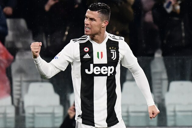 Juventus' Portuguese forward Cristiano Ronaldo celebrates after scoring his second goal during the Italian Serie A football match Juventus vs Parma on February 2, 2019 at the Juventus stadium in Turin. (Photo by Marco BERTORELLO / AFP)        (Photo credit should read MARCO BERTORELLO/AFP/Getty Images)