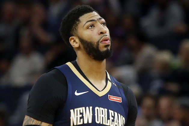 FILE- In this Jan. 12, 2019, file photo New Orleans Pelicans' Anthony Davis plays against the Minnesota Timberwolves in an NBA basketball game in Minneapolis. Davis' agent says the five-time All-Star has told the New Orleans Pelicans that he wants to be traded to a contending team. Agent Rich Paul confirmed the request to The Associated Press early Monday, Jan. 28. (AP Photo/Jim Mone, File)