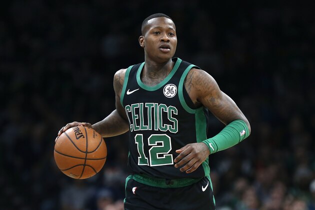 Boston Celtics' Terry Rozier brings the ball up court during the first half of an NBA basketball game against the Oklahoma City Thunder in Boston, Sunday, Feb. 3, 2019. (AP Photo/Michael Dwyer)