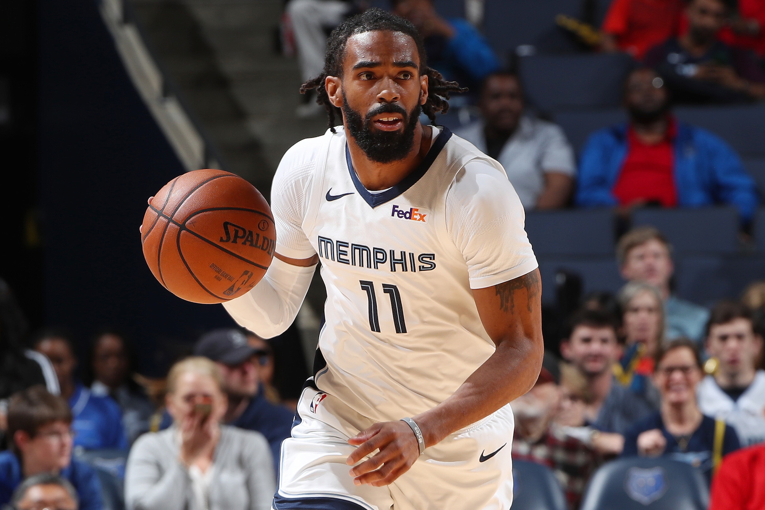 MEMPHIS, TN - FEBRUARY 5: Mike Conley #11 of the Memphis Grizzlies handles the ball during the game against the Minnesota Timberwolves on February 5, 2019 at FedExForum in Memphis, Tennessee. NOTE TO USER: User expressly acknowledges and agrees that, by downloading and or using this photograph, User is consenting to the terms and conditions of the Getty Images License Agreement. Mandatory Copyright Notice: Copyright 2019 NBAE (Photo by Joe Murphy/NBAE via Getty Images)