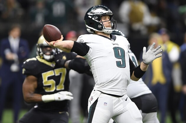 Philadelphia Eagles quarterback Nick Foles (9) works in the pocket against New Orleans Saints in the second half of an NFL divisional playoff football game in New Orleans, Sunday, Jan. 13, 2019. (AP Photo/Bill Feig)