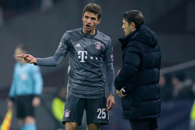 AMSTERDAM, NETHERLANDS - DECEMBER 12: (L-R) Thomas Muller of Bayern Munchen, coach Niko Kovac of Bayern Munchen  during the UEFA Champions League  match between Ajax v Bayern Munchen at the Johan Cruijff Arena on December 12, 2018 in Amsterdam Netherlands (Photo by Peter Lous/Soccrates/Getty Images)