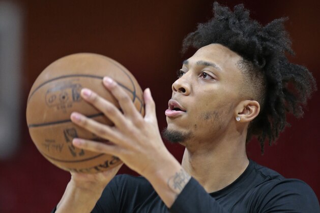 Toronto Raptors guard Malachi Richardson (22) warms up prior to an NBA basketball game against the Miami Heat, Wednesday, Dec. 26, 2018, in Miami. (AP Photo/Joel Auerbach)