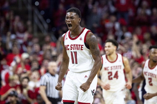 North Carolina State's Markell Johnson (11) reacts after hitting a three-point shot during the second half of an NCAA college basketball game against Auburn in Raleigh, N.C., Wednesday, Dec. 19, 2018. (AP Photo/Ben McKeown) North Carolina State's Markell Johnson (11) reacts after hitting a three-point shot during the second half of an NCAA college basketball game against Auburn in Raleigh, N.C., Wednesday, Dec. 19, 2018. (AP Photo/Ben McKeown)