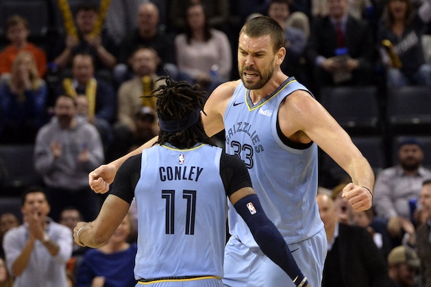 Memphis Grizzlies center Marc Gasol (33) and guard Mike Conley (11) react in the second half of an NBA basketball game against the Indiana Pacers Saturday, Jan. 26, 2019, in Memphis, Tenn. (AP Photo/Brandon Dill)