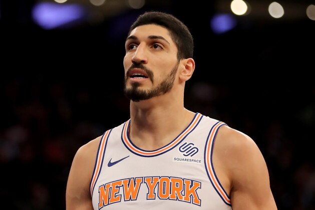 NEW YORK, NEW YORK - JANUARY 30:   Enes Kanter #00 of the New York Knicks looks on in the third quarter against the Dallas Mavericks at Madison Square Garden on January 30, 2019 in New York City.NOTE TO USER: User expressly acknowledges and agrees that, by downloading and or using this photograph, User is consenting to the terms and conditions of the Getty Images License Agreement.  (Photo by Elsa/Getty Images)