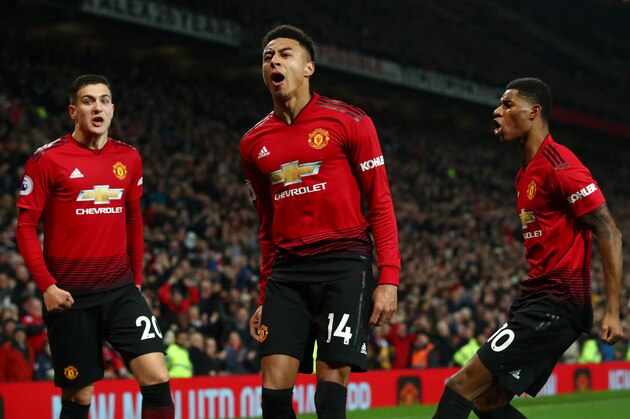 MANCHESTER, ENGLAND - DECEMBER 05: Jesse Lingard of Manchester United celebrates with teammates Diogo Dalot and Marcus Rashford after scoring his team's second goal during the Premier League match between Manchester United and Arsenal FC at Old Trafford on December 5, 2018 in Manchester, United Kingdom. (Photo by Clive Brunskill/Getty Images) MANCHESTER, ENGLAND - DECEMBER 05: Jesse Lingard of Manchester United celebrates with teammates Diogo Dalot and Marcus Rashford after scoring his team's second goal during the Premier League match between Manchester United and Arsenal FC at Old Trafford on December 5, 2018 in Manchester, United Kingdom. (Photo by Clive Brunskill/Getty Images)