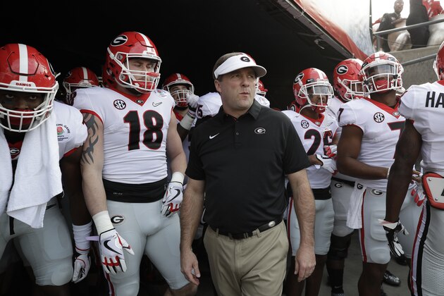 Georgia head coach Kirby Smart waits with his team to run onto the field before the Rose Bowl NCAA college football game against Oklahoma, Monday, Jan. 1, 2018, in Pasadena, Calif. (AP Photo/Jae C. Hong) Georgia head coach Kirby Smart waits with his team to run onto the field before the Rose Bowl NCAA college football game against Oklahoma, Monday, Jan. 1, 2018, in Pasadena, Calif. (AP Photo/Jae C. Hong)
