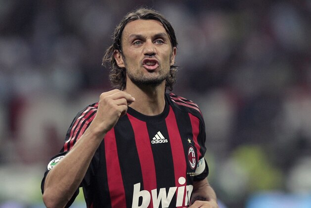 AC Milan's defender and captain Paolo Maldini gestures during his team's Italian Serie A football match against Juventus on May 10, 2009 at San Siro Stadium in Milan.   AFP PHOTO / Emilio Andreoli (Photo credit should read Emilio Andreoli/AFP/Getty Images)