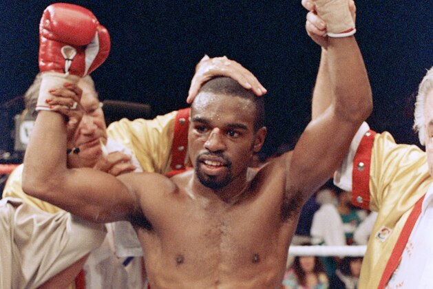 Jr. Lightweight champion Rocky Lockridge raises his arms into the air after defeating Jonny De La Rosa in their championship fight in Tucson on Sunday, Oct. 25, 1987. Lockridge beat De La Rosa on a 10th round TKO. (AP Photo/Jeff Robbins)