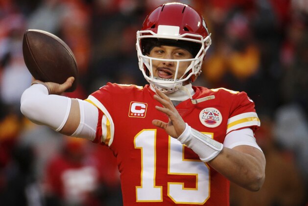 Kansas City Chiefs quarterback Patrick Mahomes warms up before the AFC Championship NFL football game against the New England Patriots, Sunday, Jan. 20, 2019, in Kansas City, Mo. (AP Photo/Charlie Riedel)