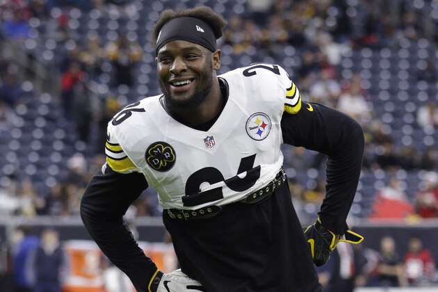 FILE - In this Dec. 25, 2017, file photo, Pittsburgh Steelers running back Le'Veon Bell (26) warms up before an NFL football game against the Houston Texans, in Houston. The Le'Veon Bell watch is almost over for the Steelers. The star running back has until 4 p.m. on Tuesday, Nov. 13, 2018, afternoon to sign his one-year franchise tender and be eligible to play this season. (AP Photo/Michael Wyke, FIle)
