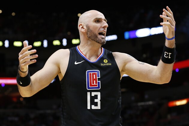 MIAMI, FLORIDA - JANUARY 23:  Marcin Gortat #13 of the LA Clippers reacts against the Miami Heat during the first half at American Airlines Arena on January 23, 2019 in Miami, Florida. NOTE TO USER: User expressly acknowledges and agrees that, by downloading and or using this photograph, User is consenting to the terms and conditions of the Getty Images License Agreement.  (Photo by Michael Reaves/Getty Images)