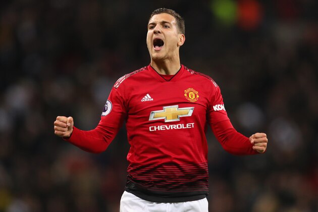 LONDON, ENGLAND - JANUARY 13:  Diogo Dalot of Manchester United celebrates victory after the Premier League match between Tottenham Hotspur and Manchester United at Wembley Stadium on January 13, 2019 in London, United Kingdom.  (Photo by Catherine Ivill/Getty Images)