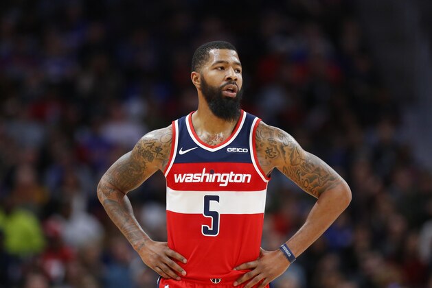 FILE - In this Dec. 26, 2018, file photo, Washington Wizards forward Markieff Morris (5) looks on during the second half of an NBA basketball game against the Detroit Pistons, in Detroit. The Washington Wizards say forward Markieff Morris will miss at least six weeks with a neck injury, the latest setback for one of the NBA’s most disappointing teams. The Wizards announced Thursday, Jan. 3, 2019, that Morris was examined by a doctor in Dallas after dealing with neck and upper back stiffness since getting hit on the chin during a game on Dec. 16. (AP Photo/Duane Burleson, File)