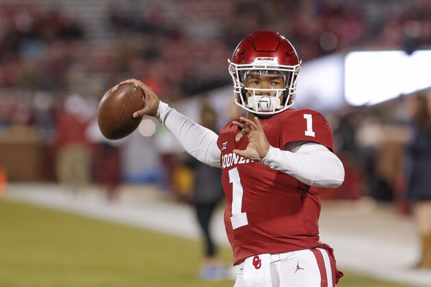 FILE - In this Saturday, Nov. 17, 2018 file photo, Oklahoma quarterback Kyler Murray (1) warms up before the start of an NCAA college football game against Kansas in Norman, Okla. No. 6 West Virginia and No. 12 Oklahoma meet Friday night in Morgantown, W.Va., with the winner earning a berth in the Big 12 championship game next week.  (AP Photo/Alonzo Adams, File)