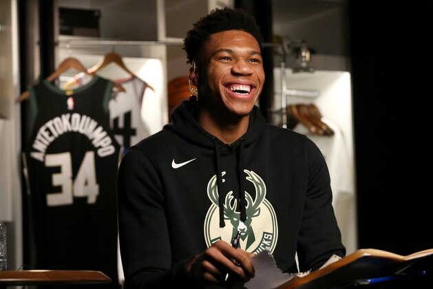 MILWAUKEE, WI - FEBRUARY 7:  Giannis Antetokounmpo #34 of the Milwaukee Bucks smiles during the 2019 All-Star Draft on February 7, 2019 at the Fiserv Forum Center in Milwaukee, Wisconsin. NOTE TO USER: User expressly acknowledges and agrees that, by downloading and or using this Photograph, user is consenting to the terms and conditions of the Getty Images License Agreement. Mandatory Copyright Notice: Copyright 2019 NBAE (Photo by Gary Dineen/NBAE via Getty Images).
