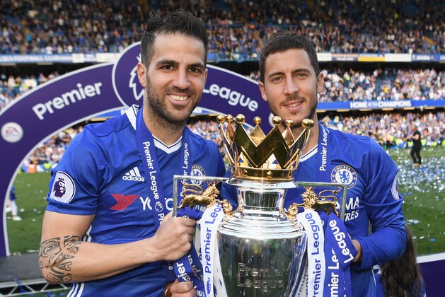 LONDON, ENGLAND - MAY 21: Cesc Fabregas and Eden Hazard of Chelsea pose with the Premier League trophy after the Premier League match between Chelsea and Sunderland at Stamford Bridge on May 21, 2017 in London, England.  (Photo by Michael Regan/Getty Images)