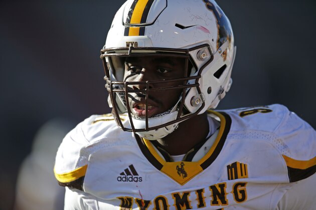 Wyoming defensive end Carl Granderson (91) looks on during the second half of an NCAA college football game against New Mexico in Albuquerque, N.M., Saturday, Nov. 24, 2018. (AP Photo/Andres Leighton)