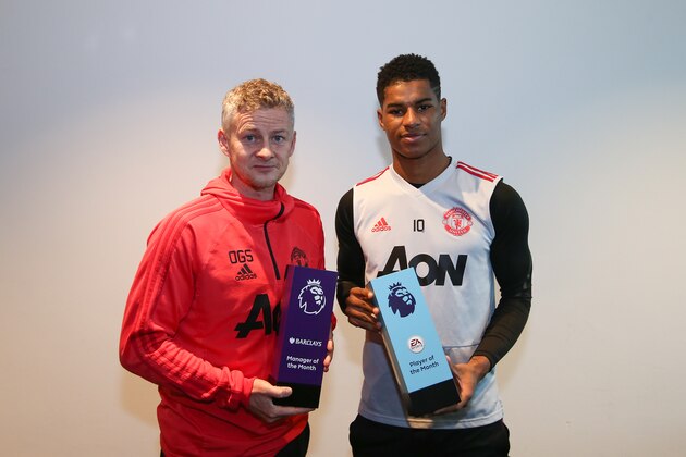 MANCHESTER, ENGLAND - FEBRUARY 07: Barclays Manager of the month Ole Gunnar Solskjaer  (L) and EA Sports Player of the Month Marcus Rashford pose at Aon Training Complex on February 07, 2019 in Manchester, England. (Photo by Jan Kruger/Getty Images for Premier League)