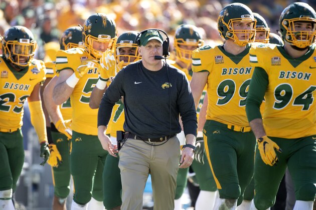 North Dakota State head coach Chris Klieman walks onto the field during a timeout in the first half of the FCS championship NCAA college football game against Eastern Washington, Saturday, Jan. 5, 2019, in Frisco, Texas. The 38-24 win was Klieman's last game at North Dakota State before he takes over as head coach at Kansas State. (AP Photo/Jeffrey McWhorter)