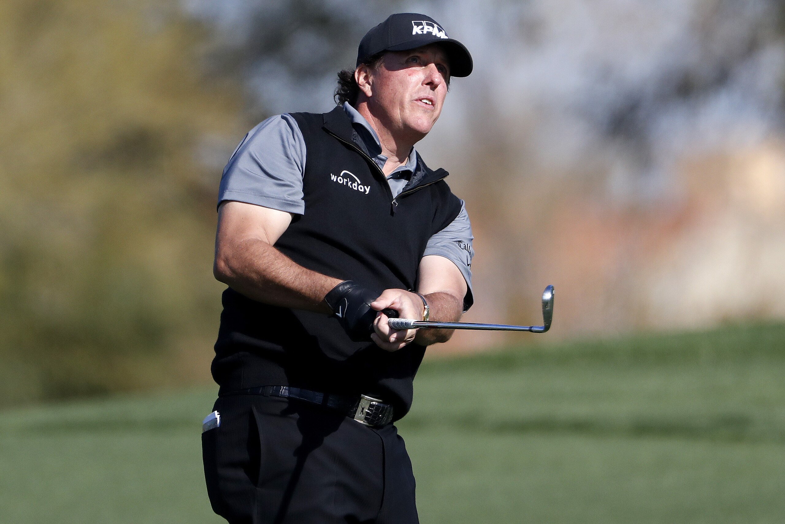 Phil Mickelson hits from the second fairway during the second round of the Phoenix Open PGA golf tournament, Friday, Feb. 1, 2019, in Scottsdale, Ariz. (AP Photo/Matt York)