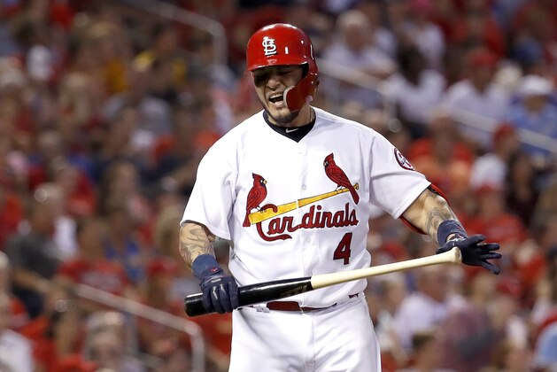 St. Louis Cardinals' Yadier Molina yells after flying out to end the second inning of a baseball game against the Milwaukee Brewers on Friday, Aug. 17, 2018, in St. Louis. (AP Photo/Jeff Roberson)