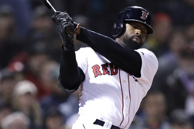 Boston Red Sox's Jackie Bradley Jr. takes a swing during the first inning of a baseball game at Fenway Park in Boston, Monday, Sept. 24, 2018. (AP Photo/Charles Krupa)