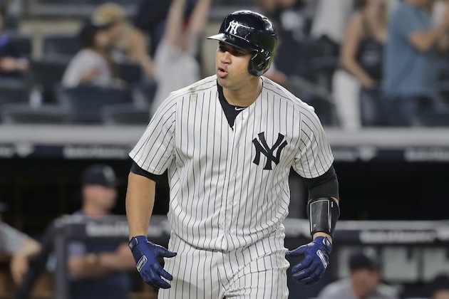 New York Yankees' Gary Sanchez reacts after hitting a two-run home run during the eighth inning of a baseball game against the Seattle Mariners at Yankee Stadium Wednesday, June 20, 2018, in New York. (AP Photo/Seth Wenig)