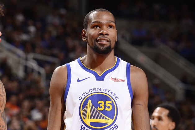 PHOENIX, AZ - FEBRUARY 8:  Kevin Durant #35 of the Golden State Warriors smiles against the Phoenix Suns on February 8, 2019 at Talking Stick Resort Arena in Phoenix, Arizona. NOTE TO USER: User expressly acknowledges and agrees that, by downloading and or using this photograph, user is consenting to the terms and conditions of the Getty Images License Agreement. Mandatory Copyright Notice: Copyright 2019 NBAE (Photo by Barry Gossage/NBAE via Getty Images)