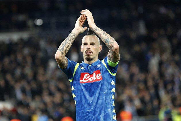 Napoli's Marek Hamsik waves his supporters at the end of the Champions League, group C, soccer match between Paris Saint Germain and Napoli at the Parc des Princes stadium in Paris, Wednesday, Oct. 24, 2018. (AP Photo/Francois Mori)
