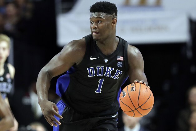 Duke's Zion Williamson (1) brings the ball up court against Wake Forest during the second half of an NCAA college basketball game in Winston-Salem, N.C., Tuesday, Jan. 8, 2019. (AP Photo/Chuck Burton)