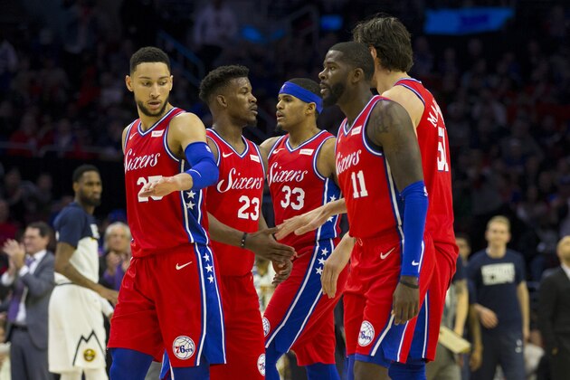 PHILADELPHIA, PA - FEBRUARY 08: Ben Simmons #25, Jimmy Butler #23, Tobias Harris #33, James Ennis #11, and Boban Marjanovic #51 of the Philadelphia 76ers congratulate one another after a timeout in the second quarter against the Denver Nuggets at the Wells Fargo Center on February 8, 2019 in Philadelphia, Pennsylvania. NOTE TO USER: User expressly acknowledges and agrees that, by downloading and or using this photograph, User is consenting to the terms and conditions of the Getty Images License Agreement. (Photo by Mitchell Leff/Getty Images)