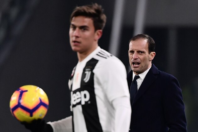 Juventus' Italian coach Massimiliano Allegri (R) shouts instructions next to Juventus' Argentine forward Paulo Dybala during the Italian Serie A football match Juventus vs Chievo Verona on January 21, 2019 at the Juventus stadium in Turin. (Photo by Marco BERTORELLO / AFP)        (Photo credit should read MARCO BERTORELLO/AFP/Getty Images)