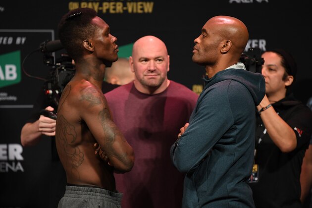 MELBOURNE, AUSTRALIA - FEBRUARY 09:  (L-R) Israel Adesanya of New Zealand and Anderson Silva of Brazil face off during the UFC 234 weigh-in at Rod Laver Arena on February 09, 2019 in the Melbourne Australia. (Photo by Jeff Bottari/Zuffa LLC/Zuffa LLC via Getty Images)