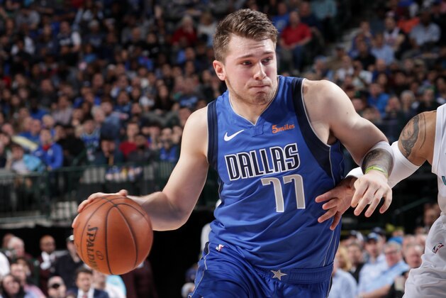 DALLAS, TX - FEBRUARY 6:  Luka Doncic #77 of the Dallas Mavericks handles the ball against the Charlotte Hornets on February 6, 2019 at the American Airlines Center in Dallas, Texas. NOTE TO USER: User expressly acknowledges and agrees that, by downloading and or using this photograph, User is consenting to the terms and conditions of the Getty Images License Agreement. Mandatory Copyright Notice: Copyright 2019 NBAE (Photo by Glenn James/NBAE via Getty Images)