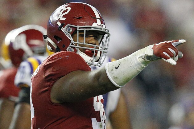 FILE - In this Nov. 4, 2017 file photo, Alabama defensive lineman Quinnen Williams celebrates after sacking LSU quarterback Myles Brennan during the second half of an NCAA college football game, in Tuscaloosa, Ala. Williams has been hot all season, really, but he was a monster in Alabama’s biggest game of the season so far against LSU. He had 10 tackles, seven solo stops, and 2½ sacks against the Tigers. (AP Photo/Brynn Anderson, File)