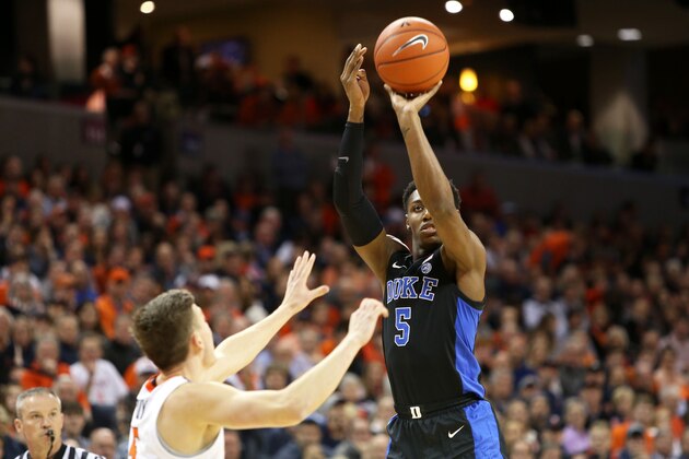 CHARLOTTESVILLE, VA - FEBRUARY 09: RJ Barrett #5 of the Duke Blue Devils shoots over Kyle Guy #5 of the Virginia Cavaliers in the first half during a game at John Paul Jones Arena on February 9, 2019 in Charlottesville, Virginia. (Photo by Ryan M. Kelly/Getty Images)