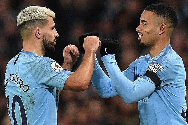 Manchester City's Argentinian striker Sergio Aguero (L) leaves the pitch after being substituted off for Manchester City's Brazilian striker Gabriel Jesus during the English Premier League football match between Manchester City and Burnley at the Etihad Stadium in Manchester, north west England, on February 10, 2019. (Photo by Paul ELLIS / AFP) / RESTRICTED TO EDITORIAL USE. No use with unauthorized audio, video, data, fixture lists, club/league logos or 'live' services. Online in-match use limited to 120 images. An additional 40 images may be used in extra time. No video emulation. Social media in-match use limited to 120 images. An additional 40 images may be used in extra time. No use in betting publications, games or single club/league/player publications. /         (Photo credit should read PAUL ELLIS/AFP/Getty Images)