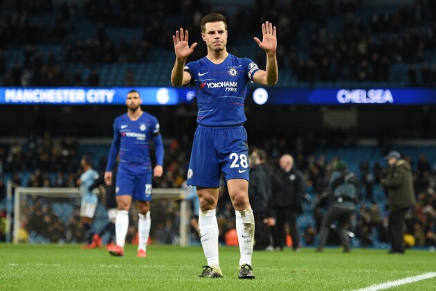 Chelsea's Spanish defender Cesar Azpilicueta applauds the fans following the English Premier League football match between Manchester City and Chelsea at the Etihad Stadium in Manchester, north west England, on February 10, 2019. - Manchester City won the match 6-0. (Photo by Oli SCARFF / AFP) / RESTRICTED TO EDITORIAL USE. No use with unauthorized audio, video, data, fixture lists, club/league logos or 'live' services. Online in-match use limited to 120 images. An additional 40 images may be used in extra time. No video emulation. Social media in-match use limited to 120 images. An additional 40 images may be used in extra time. No use in betting publications, games or single club/league/player publications. /         (Photo credit should read OLI SCARFF/AFP/Getty Images)