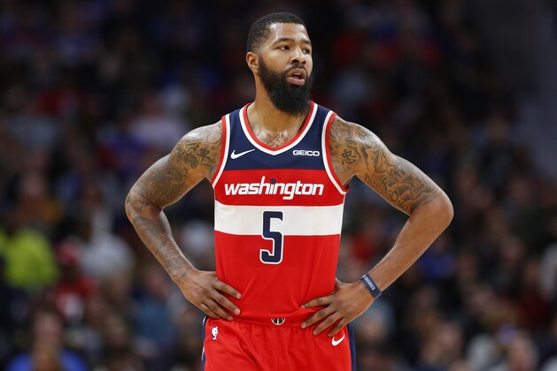 FILE - In this Dec. 26, 2018, file photo, Washington Wizards forward Markieff Morris (5) looks on during the second half of an NBA basketball game against the Detroit Pistons, in Detroit. The Washington Wizards say forward Markieff Morris will miss at least six weeks with a neck injury, the latest setback for one of the NBA’s most disappointing teams. The Wizards announced Thursday, Jan. 3, 2019, that Morris was examined by a doctor in Dallas after dealing with neck and upper back stiffness since getting hit on the chin during a game on Dec. 16. (AP Photo/Duane Burleson, File)