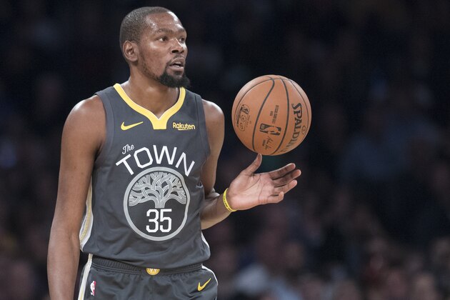Golden State Warriors forward Kevin Durant handles the ball during the first half of an NBA basketball game against the New York Knicks, Friday, Oct. 26, 2018, at Madison Square Garden in New York. (AP Photo/Mary Altaffer)